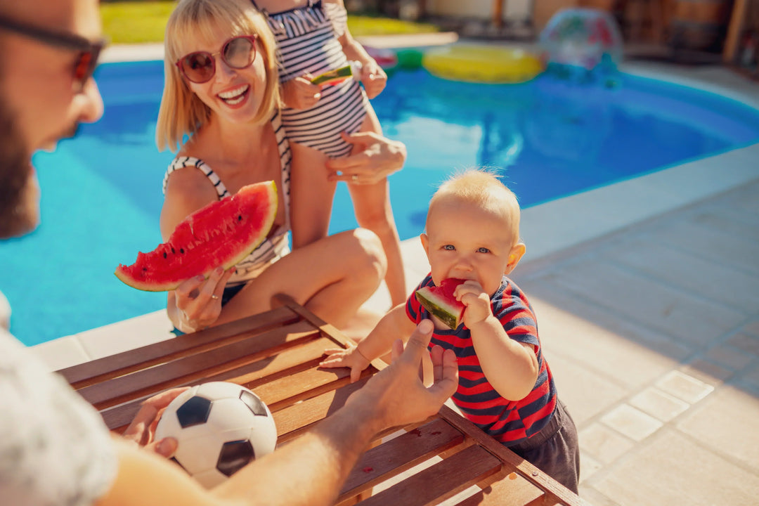 Baby joining a family meal during a relaxed 4th of July celebration